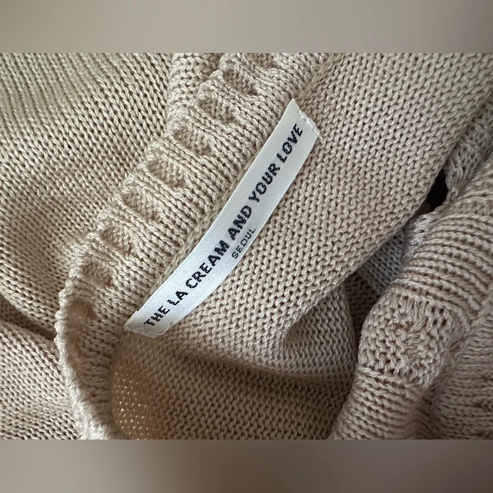 The LA cream and ur luv seoul ripped knitted crop top